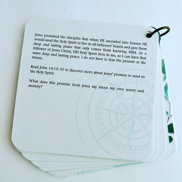 A devotion with a turquoise compass rose etched in the background.