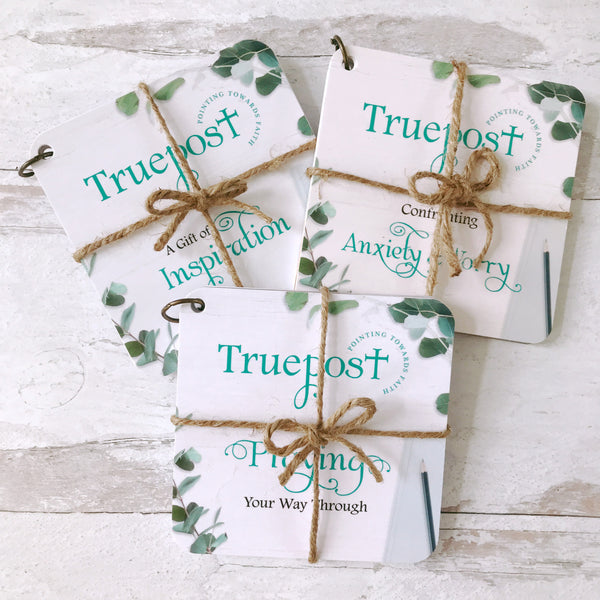 Scripture devotional cards beautifully wrapped with natural jute twine, that's  tied in a bow, for a charming rustic vibe.