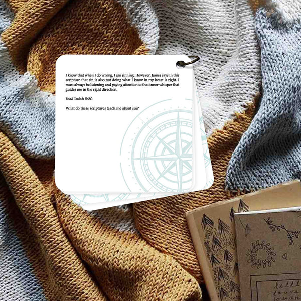 Devotion about sin. Photo of a devotion card laying on a blanket. Daily devotion.