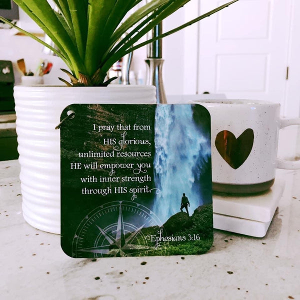 Ephesians 3:16 printed over a photo of a waterfall. Coffee in the background and a house plant. Scripture gift. Scripture cards.