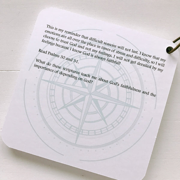 A daily devotion printed over a turquoise-colored compass rose.