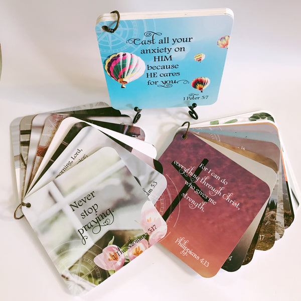 The 3 scripture devotional card sets in this collection and the display easel, hightlighting different scripture cards.
