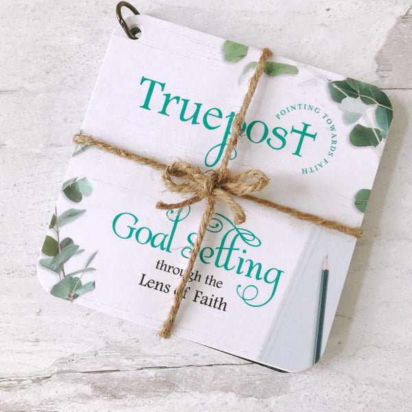 Scripture devotional cards beautifully wrapped with natural jute twine, that's  tied in a bow, for a charming rustic vibe.  Gifts with Bible verses on them. Bible verse gift idea.