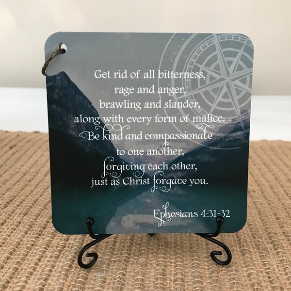 Scripture card of Ephesians 4:31-32 printed over a photo of two mountains. Scripture for the day card.