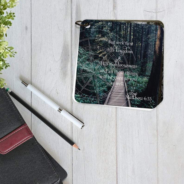 A gift of thanks featuring the scripture of Matthew 6:33 printed over a photo of a wooden bridge going into a beautiful green forest.
