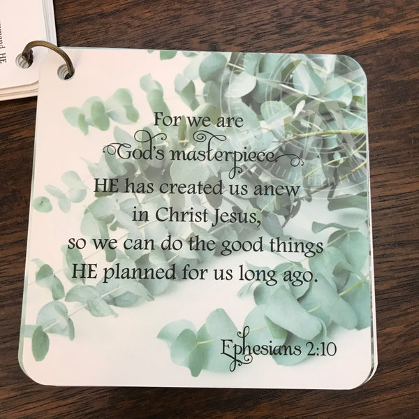 Scripture card of Ephesians 2:10 printed over a photo of eucalyptus.